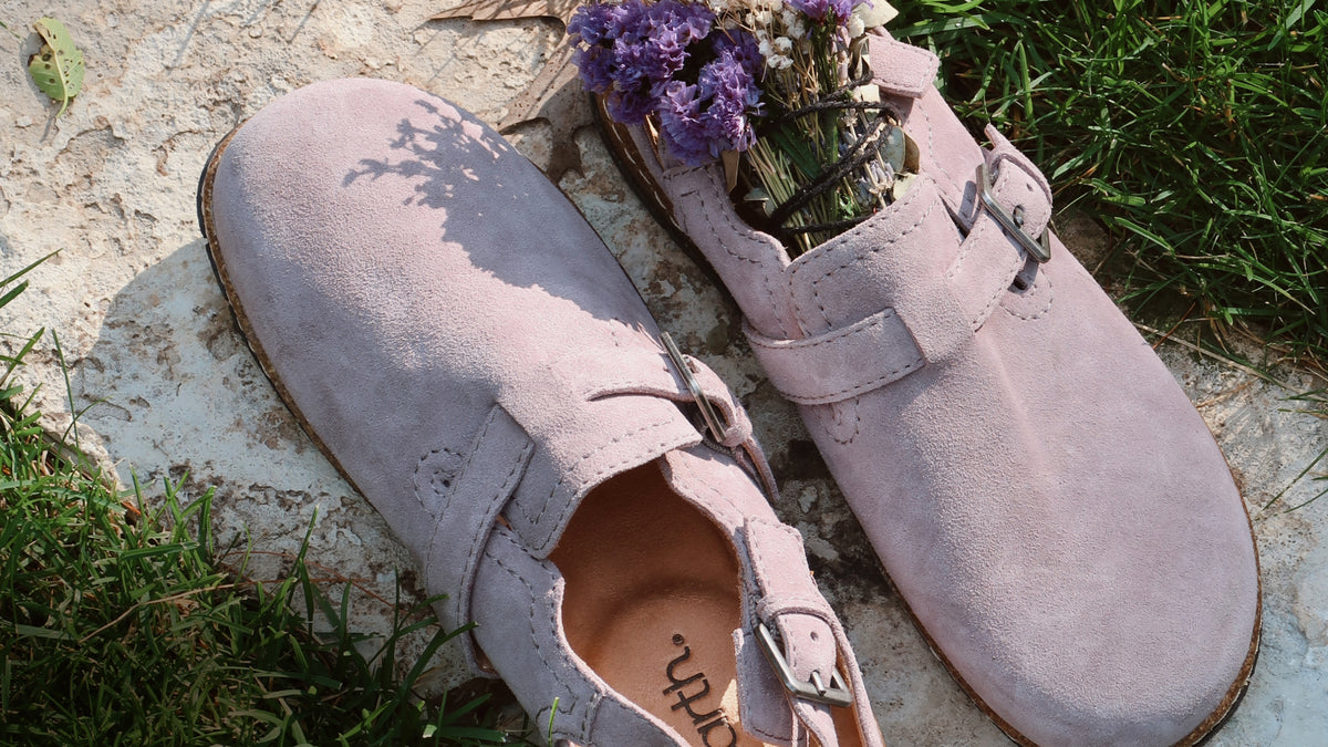 Promotional banner featuring flat clogs
