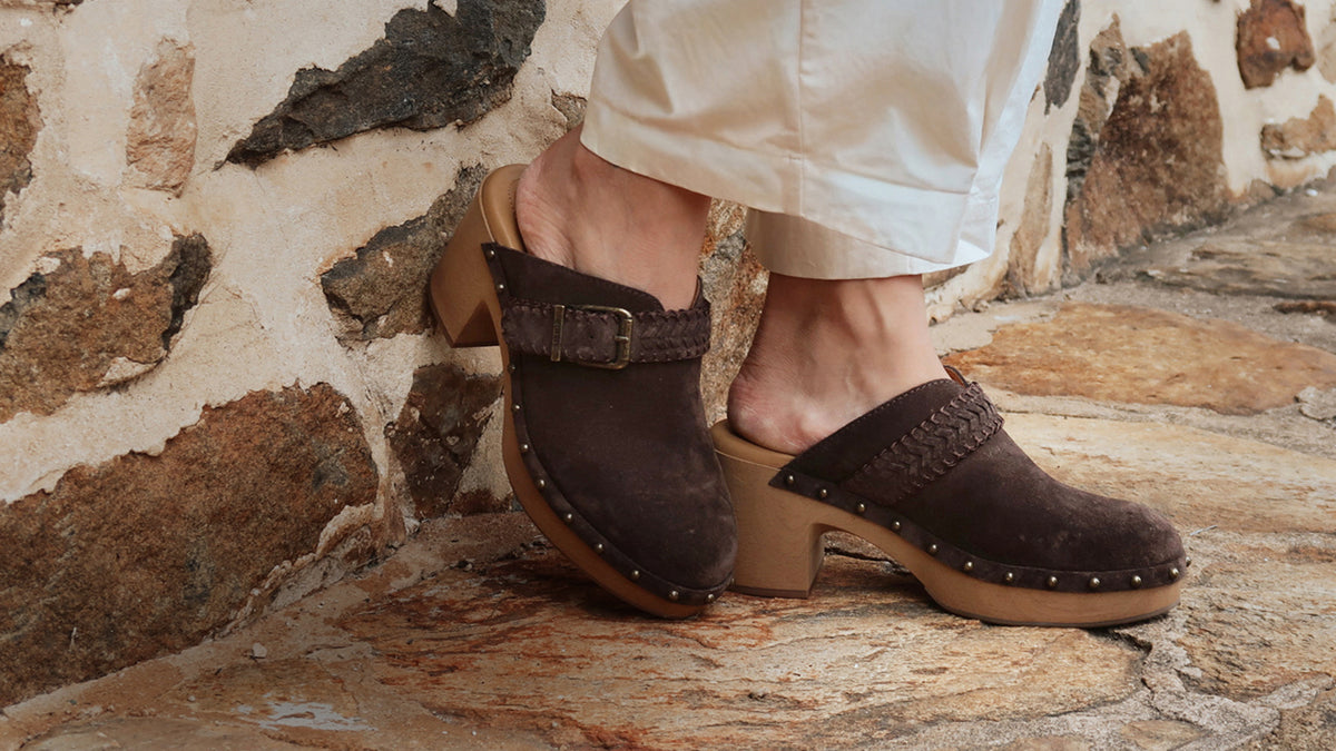 Promotional banner featuring heeled clogs