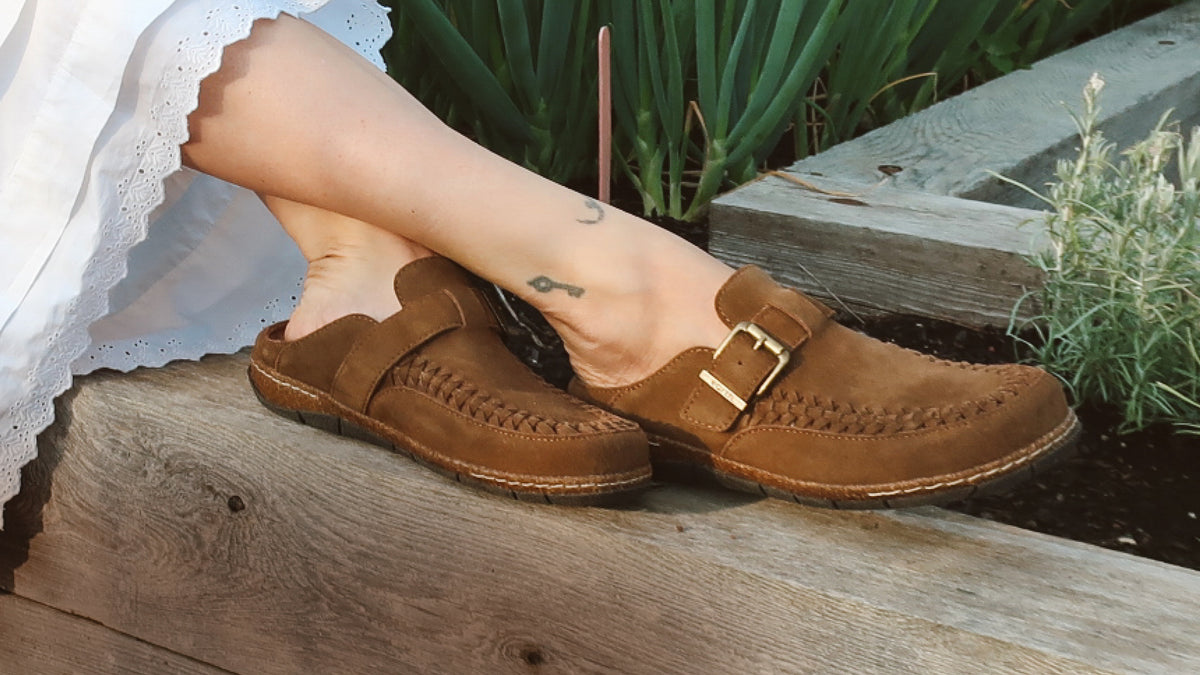 Promotional banner featuring leather clogs